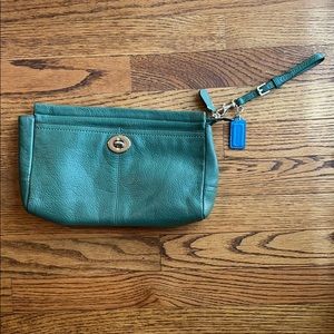 Green leather coach wristlet handbag